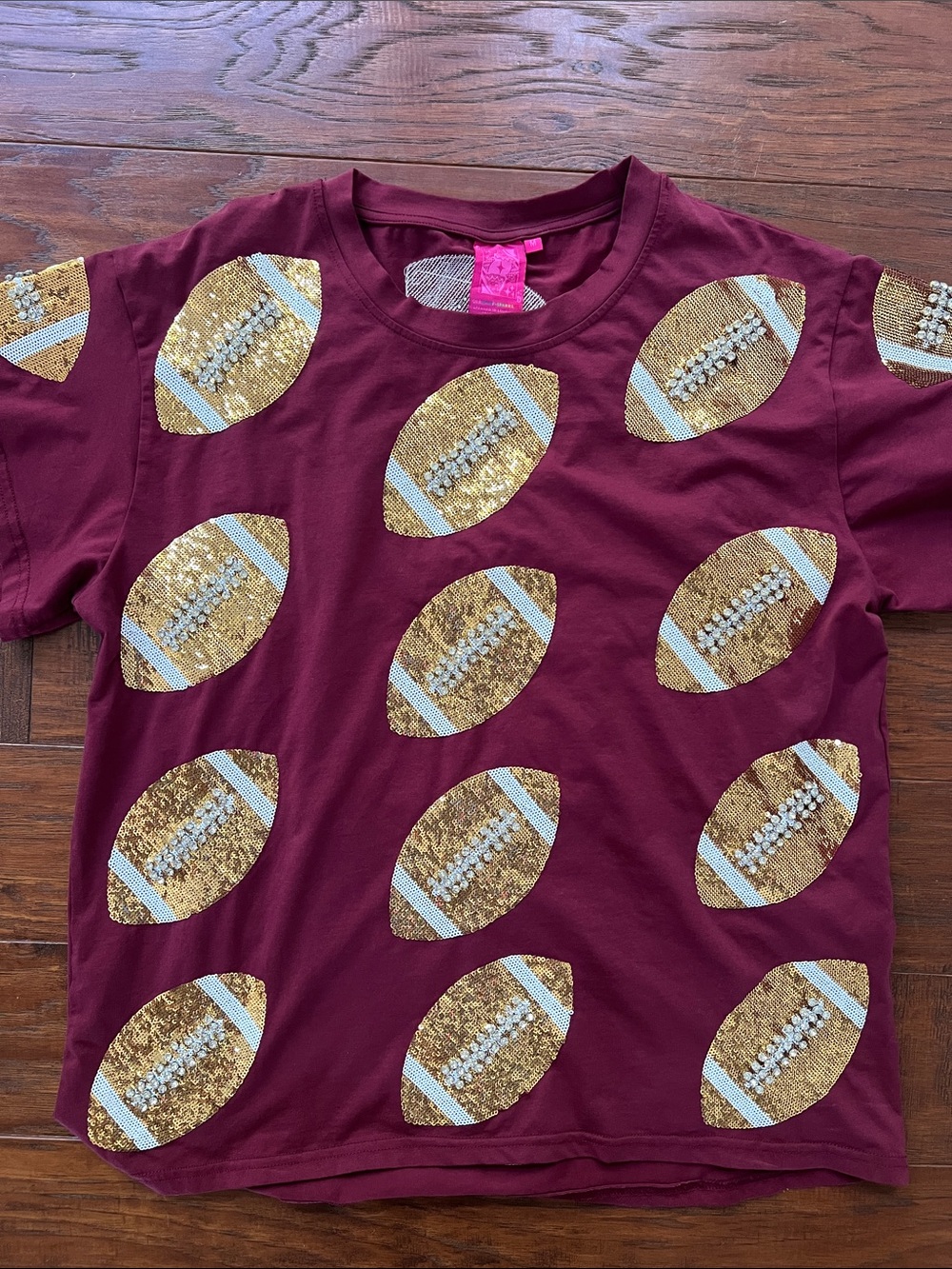 QUEEN OF SPARKLES Women’s Garnet Sequin Football Tee - size M